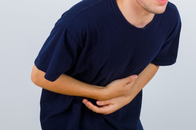 Ilustrasi seseorang mengalami asam lambung naik (4)